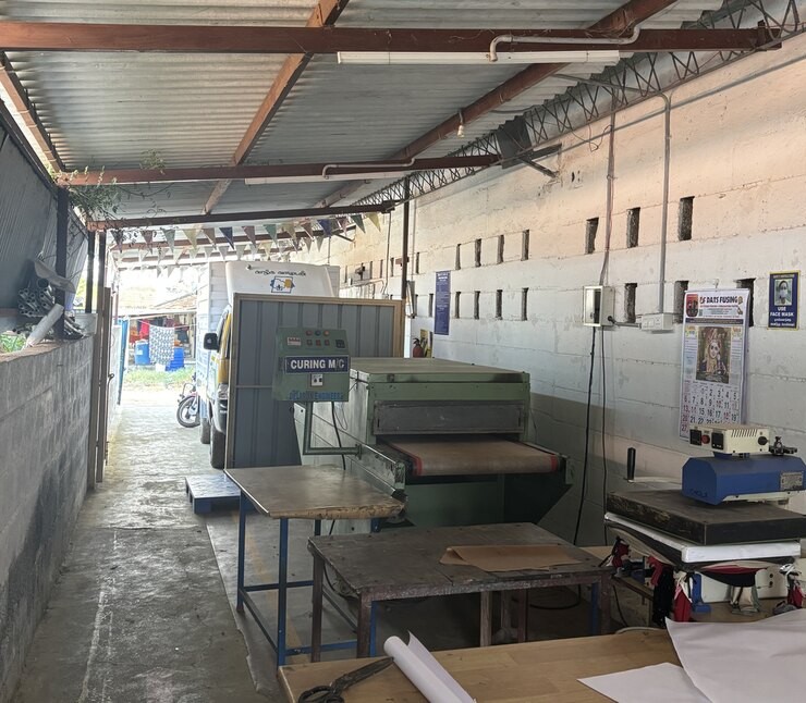 Curing machine and fusing press station