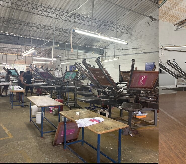 Manual screen printing station with operators